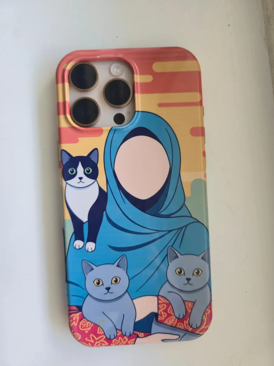 Delivered Aura Case on an iPhone Pro: illustrated cats and a woman in a blue headscarf, glossy finish